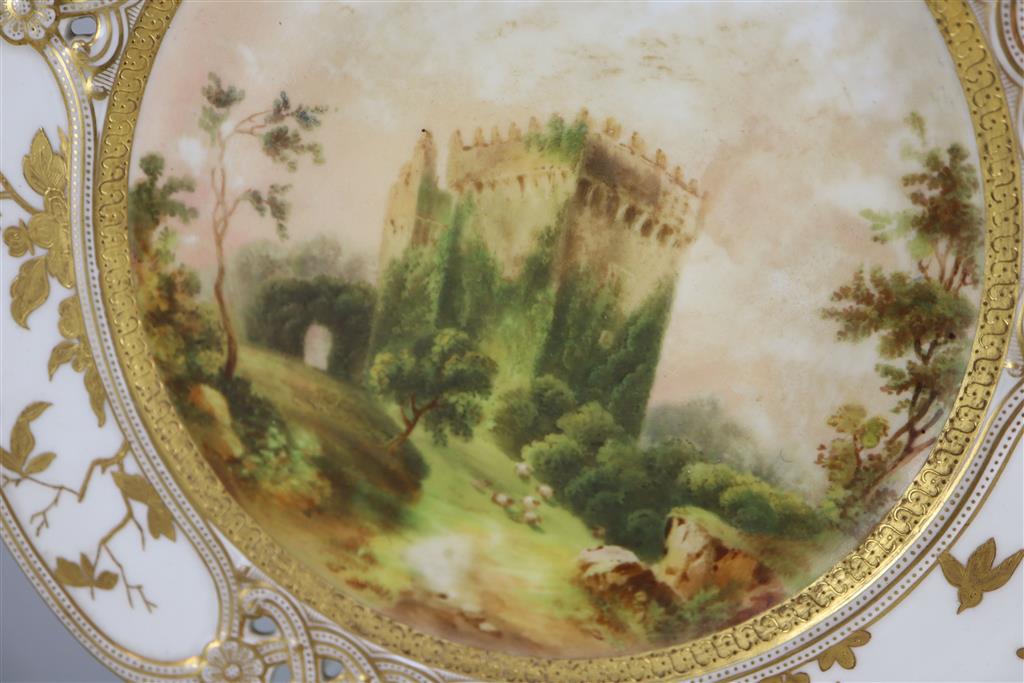 A set of seventeen Coalport topographical dessert plates, c.1880, 24cm diameter